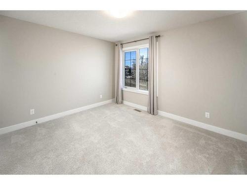 7 Springbluff Point Sw, Calgary, AB - Indoor Photo Showing Other Room