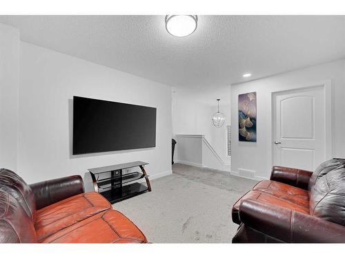 33 Savanna Row Ne, Calgary, AB - Indoor Photo Showing Living Room