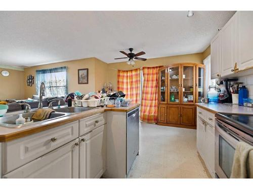 28 Coral Springs Close Ne, Calgary, AB - Indoor Photo Showing Kitchen With Double Sink