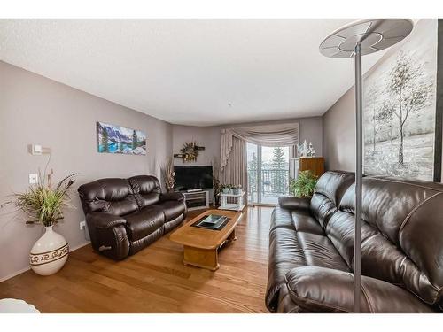 411-55 Arbour Grove Close Nw, Calgary, AB - Indoor Photo Showing Living Room