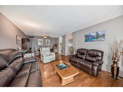 411-55 Arbour Grove Close Nw, Calgary, AB - Indoor Photo Showing Living Room