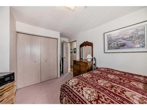 411-55 Arbour Grove Close Nw, Calgary, AB - Indoor Photo Showing Bedroom