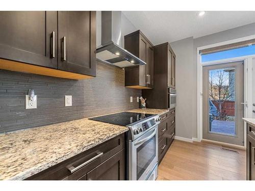 91 Cranbrook Place Se, Calgary, AB - Indoor Photo Showing Kitchen With Upgraded Kitchen