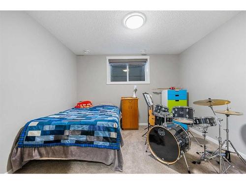 91 Cranbrook Place Se, Calgary, AB - Indoor Photo Showing Bedroom