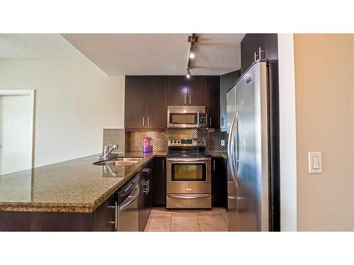 608-210 15 Avenue Se, Calgary, AB - Indoor Photo Showing Kitchen With Stainless Steel Kitchen With Upgraded Kitchen