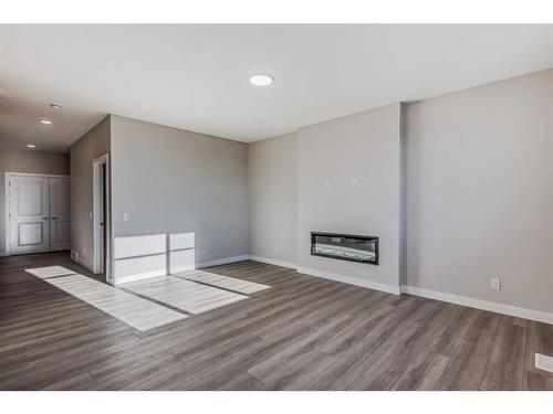 251 Belvedere Drive Se, Calgary, AB - Indoor With Fireplace