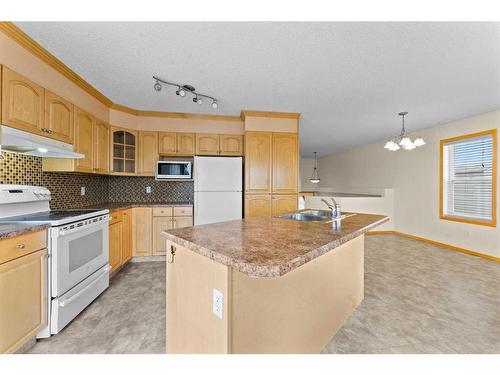 244 Covemeadow Road Ne, Calgary, AB - Indoor Photo Showing Kitchen With Double Sink