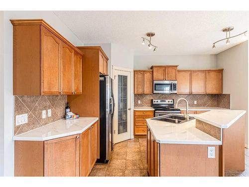 340 Crimson Close, Chestermere, AB - Indoor Photo Showing Kitchen With Double Sink