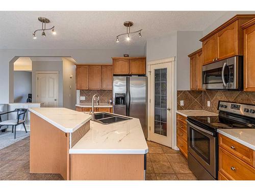 340 Crimson Close, Chestermere, AB - Indoor Photo Showing Kitchen With Double Sink