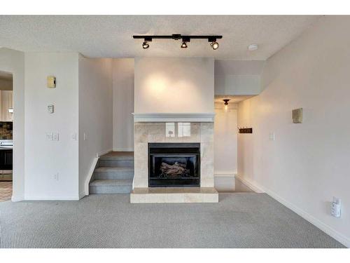 1405 22 Avenue Sw, Calgary, AB - Indoor Photo Showing Living Room With Fireplace