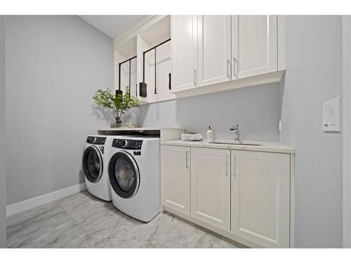 286 Coopers Cove Sw, Airdrie, AB - Indoor Photo Showing Laundry Room