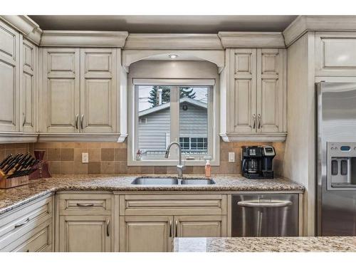 412 Allston Avenue Se, Calgary, AB - Indoor Photo Showing Kitchen With Double Sink