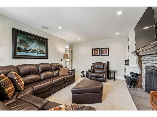 412 Allston Avenue Se, Calgary, AB - Indoor Photo Showing Living Room With Fireplace