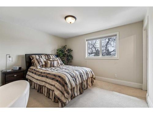 412 Allston Avenue Se, Calgary, AB - Indoor Photo Showing Bedroom