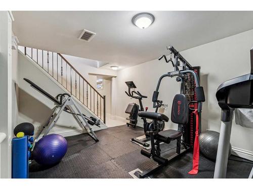412 Allston Avenue Se, Calgary, AB - Indoor Photo Showing Gym Room