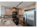 1306-210 15 Avenue Se, Calgary, AB  - Indoor Photo Showing Kitchen With Double Sink 