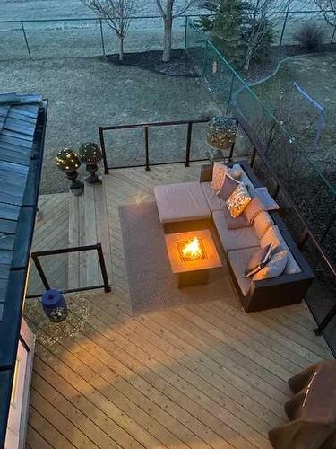 215 Gleneagles View, Cochrane, AB - Outdoor With Deck Patio Veranda