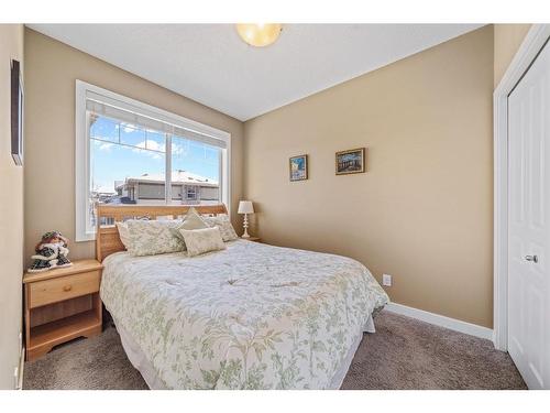 309-22 Panatella Road Nw, Calgary, AB - Indoor Photo Showing Bedroom