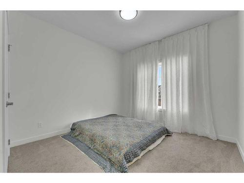 136 Sandpiper Landing, Chestermere, AB - Indoor Photo Showing Bedroom