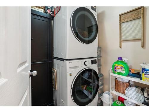 82 Eversyde Court Sw, Calgary, AB - Indoor Photo Showing Laundry Room