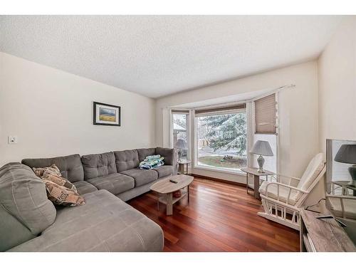 240 Deer River Place Se, Calgary, AB - Indoor Photo Showing Living Room