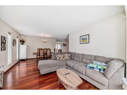 240 Deer River Place Se, Calgary, AB - Indoor Photo Showing Living Room