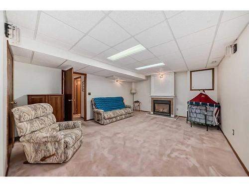 240 Deer River Place Se, Calgary, AB - Indoor With Fireplace