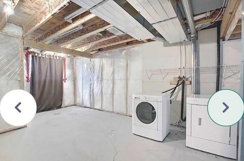 1819 New Brighton Drive Se, Calgary, AB - Indoor Photo Showing Laundry Room