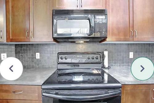 1819 New Brighton Drive Se, Calgary, AB - Indoor Photo Showing Kitchen