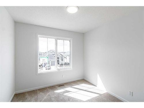 183 Knight Avenue, Crossfield, AB - Indoor Photo Showing Other Room