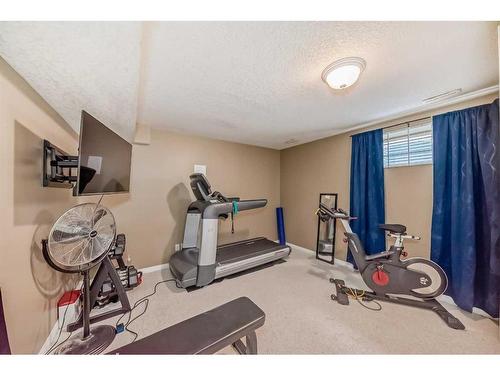 68 Arbour Crest Court Nw, Calgary, AB - Indoor Photo Showing Gym Room