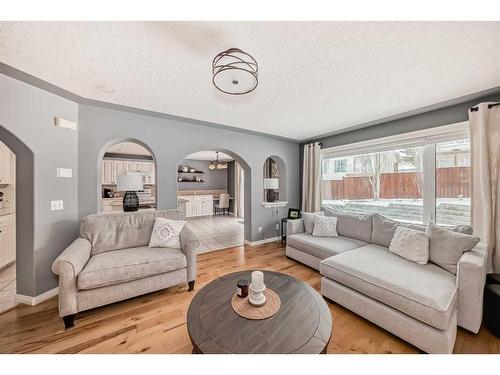 68 Arbour Crest Court Nw, Calgary, AB - Indoor Photo Showing Living Room