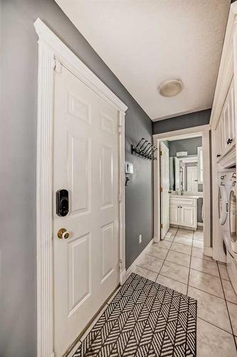 68 Arbour Crest Court Nw, Calgary, AB - Indoor Photo Showing Laundry Room