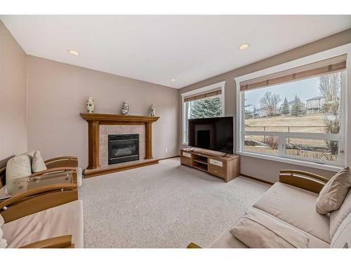 55 Panorama Hills Point Nw, Calgary, AB - Indoor Photo Showing Living Room With Fireplace