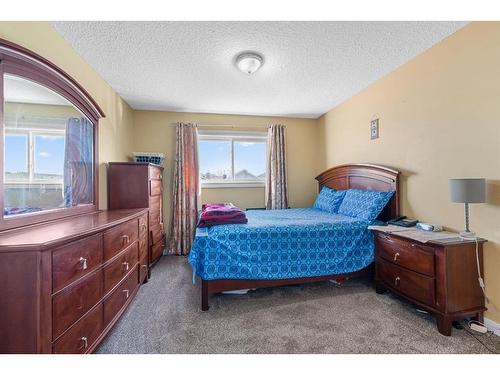 255 Taravista Drive Ne, Calgary, AB - Indoor Photo Showing Bedroom