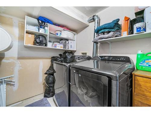 255 Taravista Drive Ne, Calgary, AB - Indoor Photo Showing Laundry Room