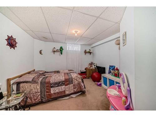71 Taradale Drive Ne, Calgary, AB - Indoor Photo Showing Bedroom