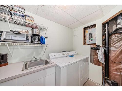 71 Taradale Drive Ne, Calgary, AB - Indoor Photo Showing Laundry Room