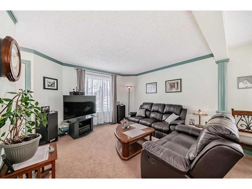 71 Taradale Drive Ne, Calgary, AB - Indoor Photo Showing Living Room