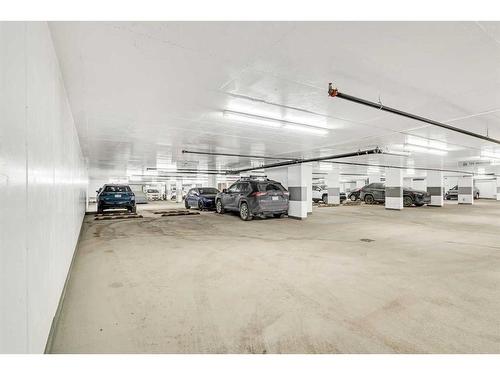 601-118 Waterfront Court Sw, Calgary, AB - Indoor Photo Showing Garage