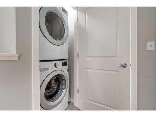 311 Ascot Circle Sw, Calgary, AB - Indoor Photo Showing Laundry Room