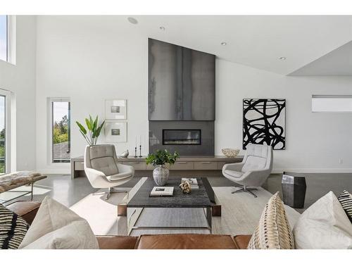 1114 Bellevue Avenue Se, Calgary, AB - Indoor Photo Showing Living Room With Fireplace