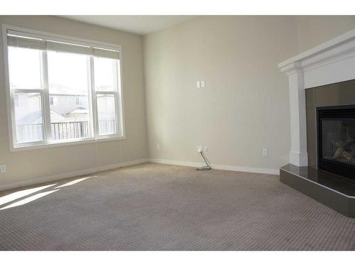 1217 Brightoncrest Common Se, Calgary, AB - Indoor With Fireplace