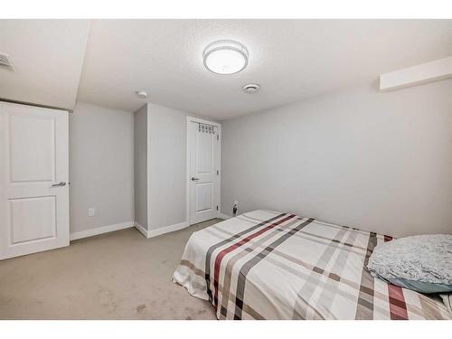 155 Penbrooke Close Se, Calgary, AB - Indoor Photo Showing Bedroom