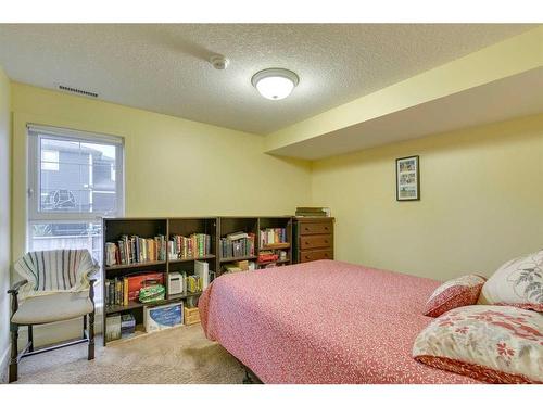 905 Mckinnon Drive Ne, Calgary, AB - Indoor Photo Showing Bedroom