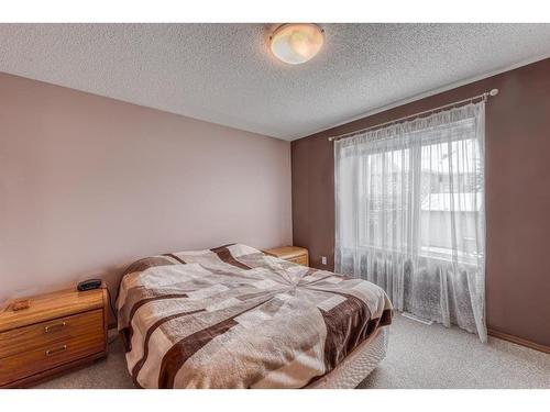 160 Eversyde Circle Sw, Calgary, AB - Indoor Photo Showing Bedroom