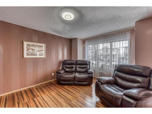 160 Eversyde Circle Sw, Calgary, AB - Indoor Photo Showing Living Room