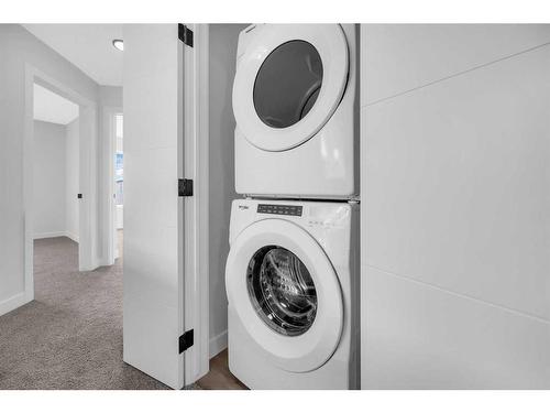 55 Silverton Glen Crescent, Calgary, AB - Indoor Photo Showing Laundry Room