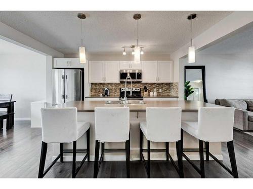 350 Cranford Drive Se, Calgary, AB - Indoor Photo Showing Kitchen With Upgraded Kitchen