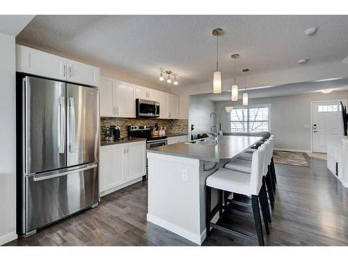 350 Cranford Drive Se, Calgary, AB - Indoor Photo Showing Kitchen With Stainless Steel Kitchen With Double Sink With Upgraded Kitchen